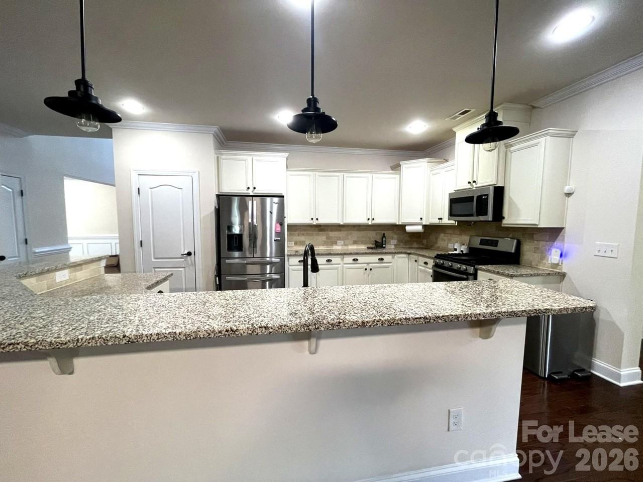 10692 Skipping Rock Ln Nw - Photo 2 of 21