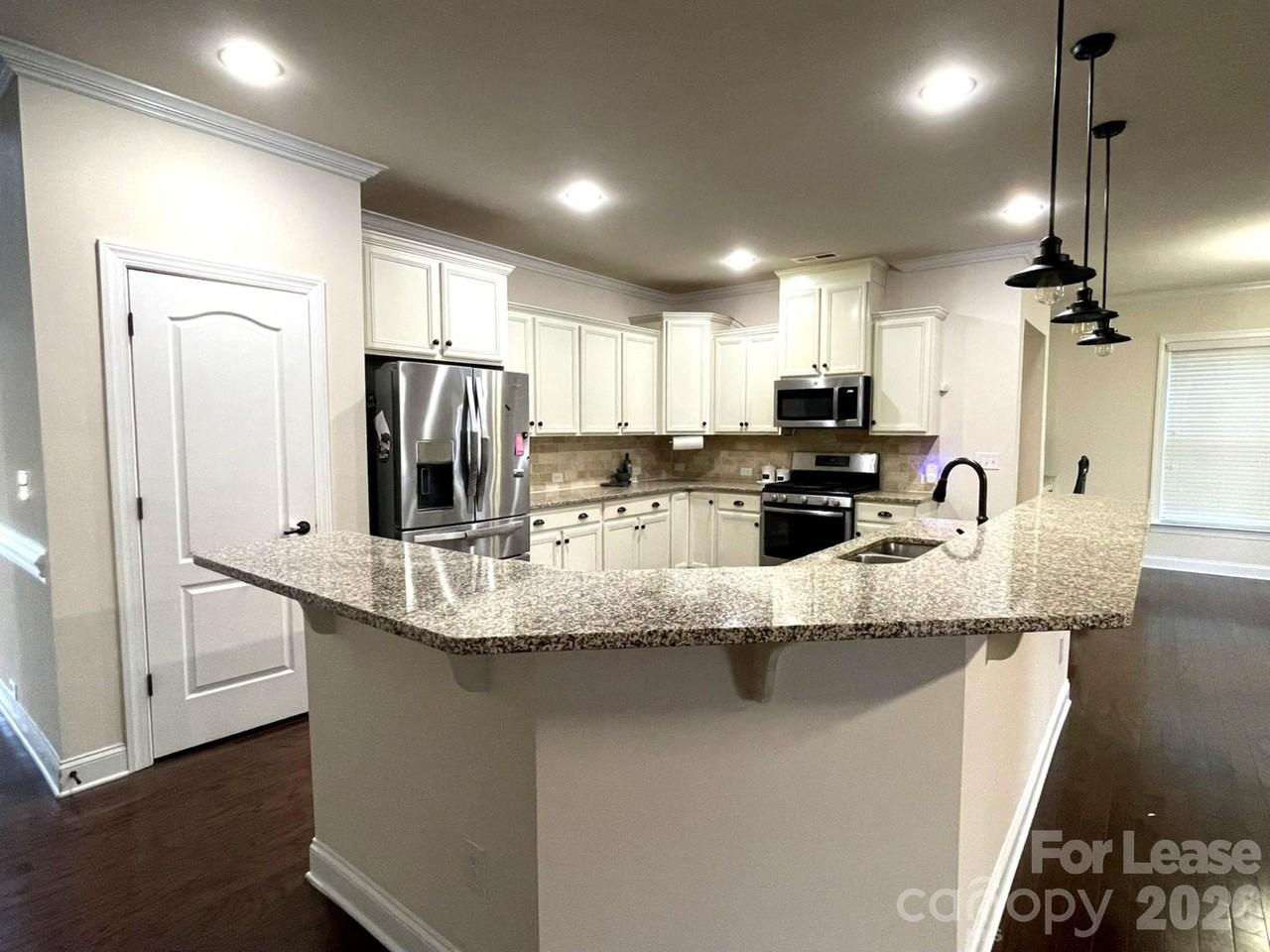 10692 Skipping Rock Ln Nw - Photo 3 of 21