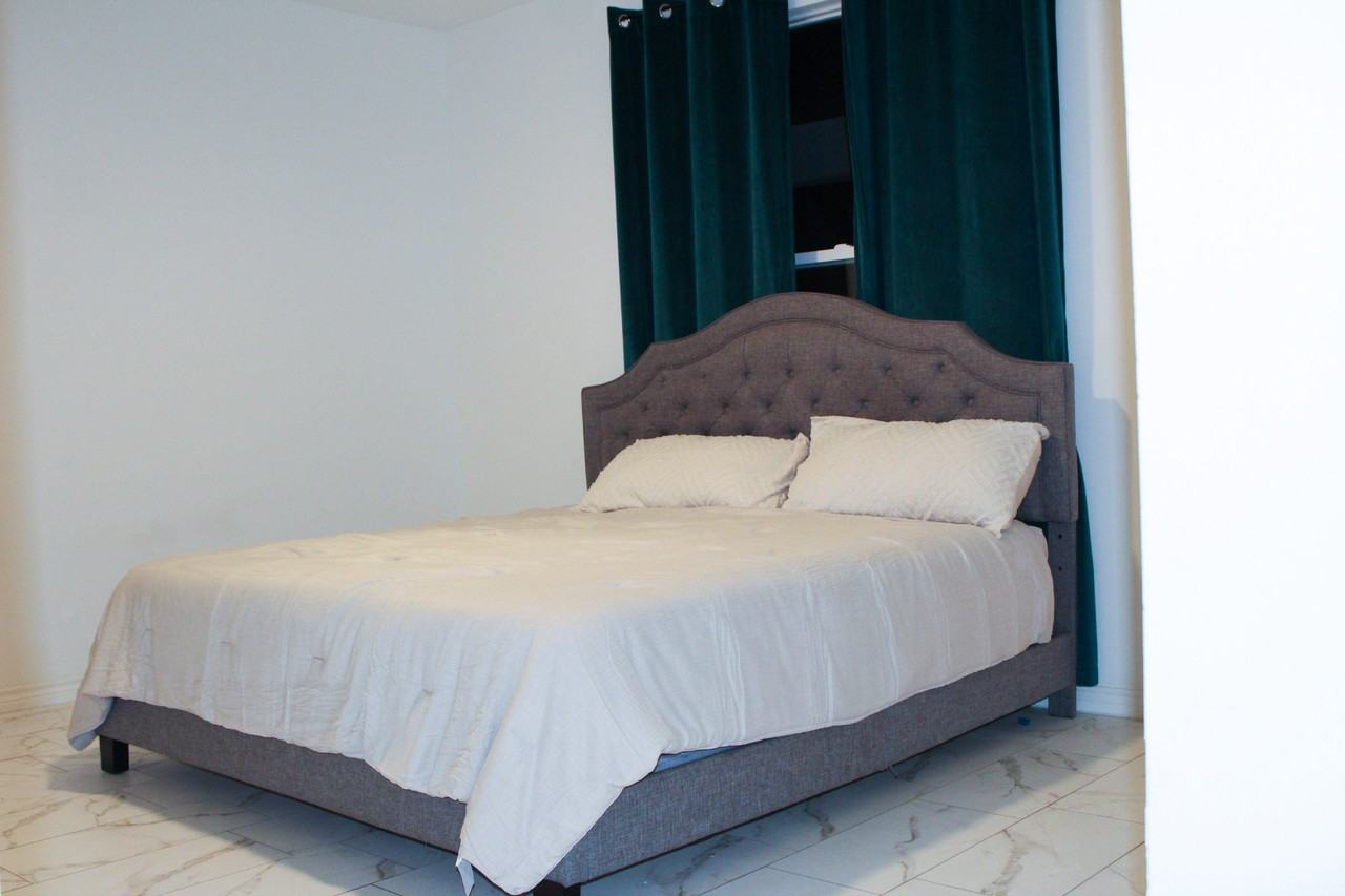 Claude St - Photo 3 of 3