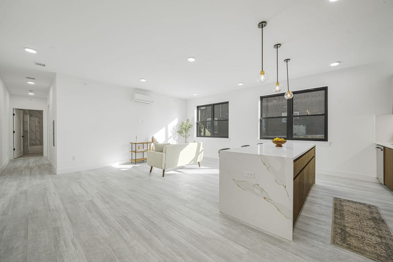 JFK RESIDENCES - Photo 3 of 13