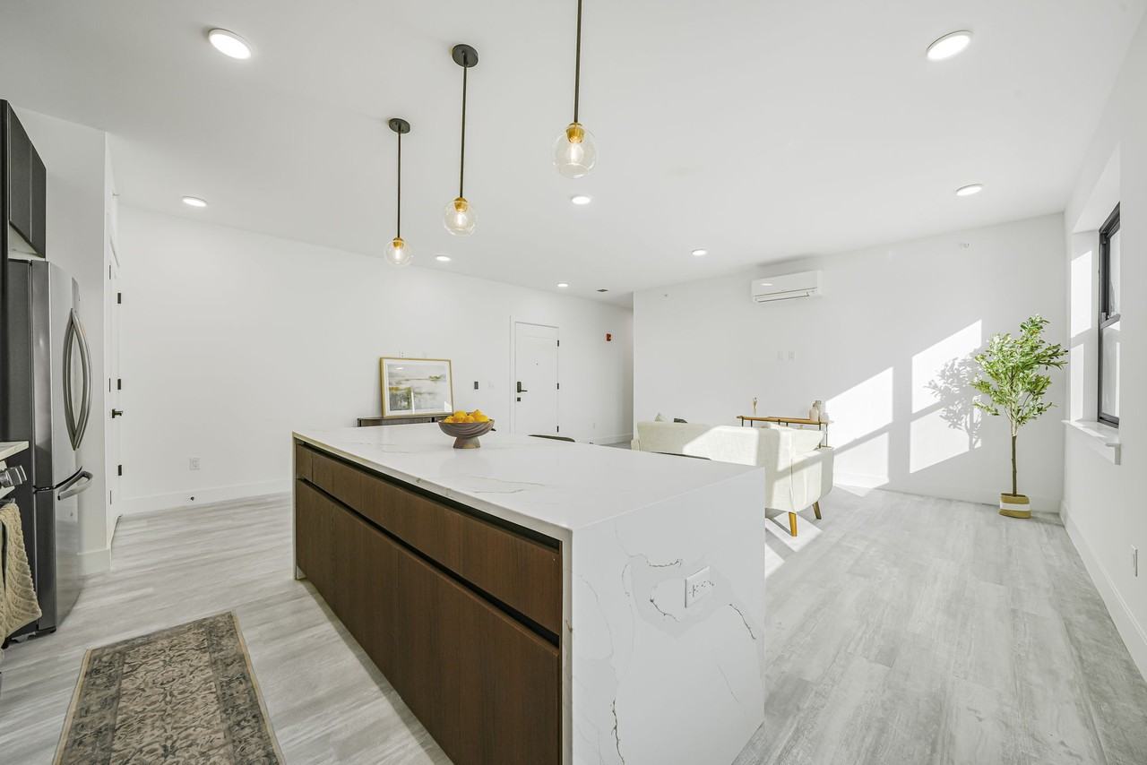 JFK RESIDENCES - Photo 4 of 13