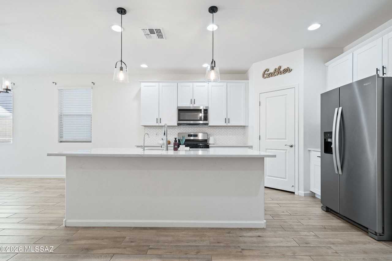 12486 N Reeves Pl - Photo 4 of 32