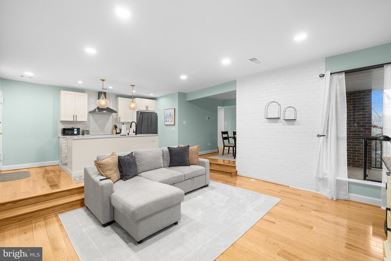 9820 Georgia Ave #21-302 - Photo 2 of 24