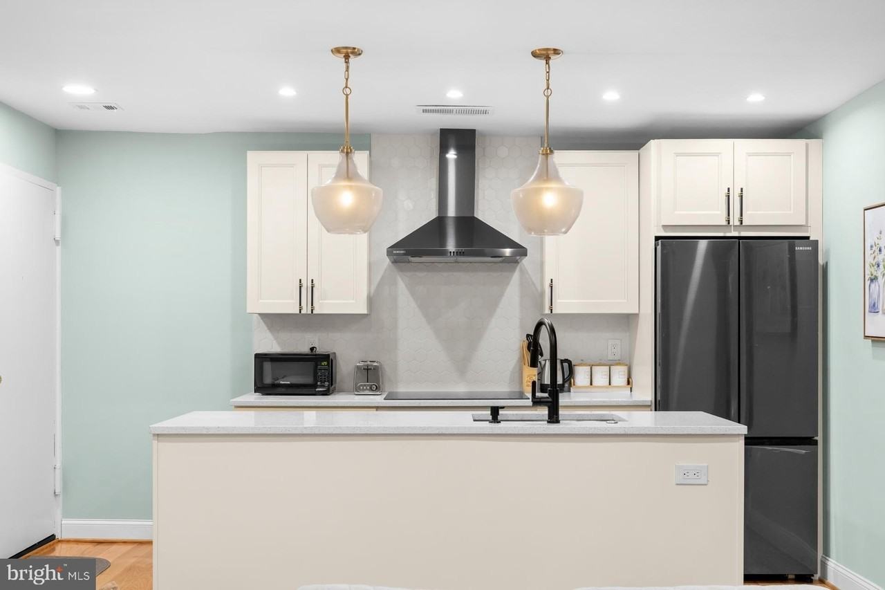 9820 Georgia Ave #21-302 - Photo 5 of 24