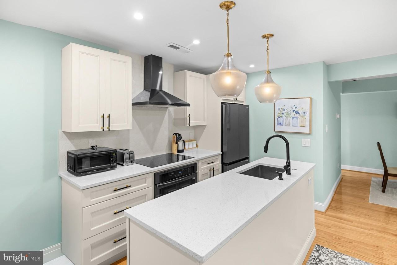 9820 Georgia Ave #21-302 - Photo 6 of 24