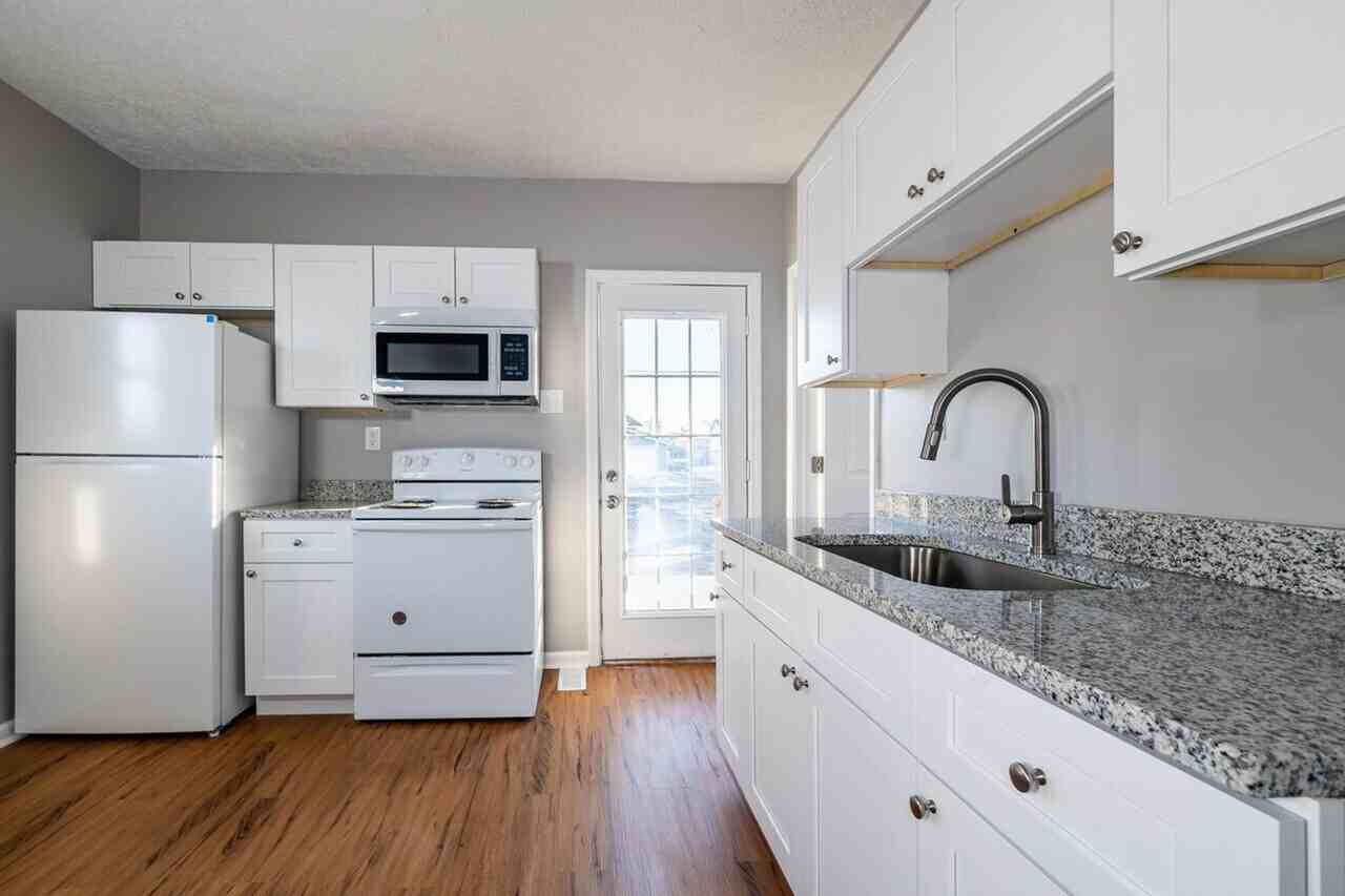 1425 Avenue C - Photo 3 of 4