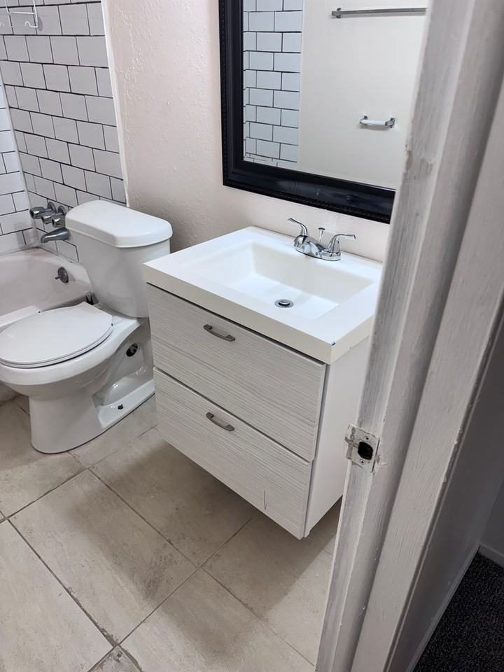 1129 S 124th East Ave - Photo 7 of 18