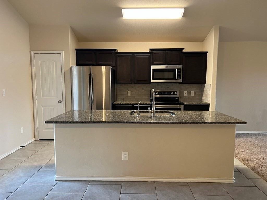 1704 Rattler Ln - Photo 4 of 20