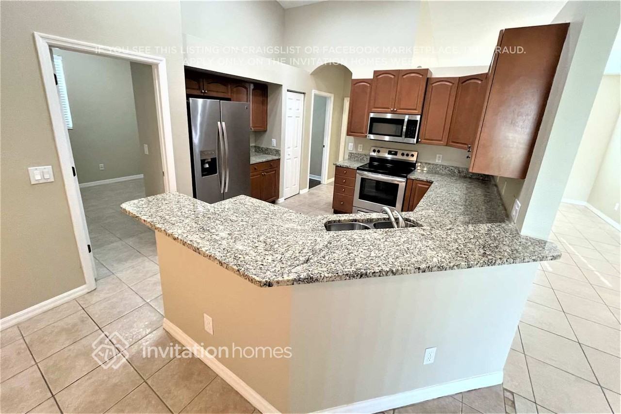 7018 43rd Ave E - Photo 4 of 18