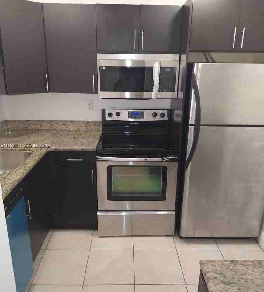 488 Nw 165th Street Rd #B310 - Photo 2 of 10