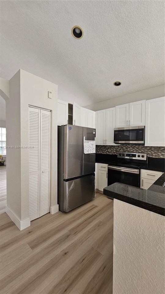 7983 Nw 18th Ct #0 - Photo 4 of 16