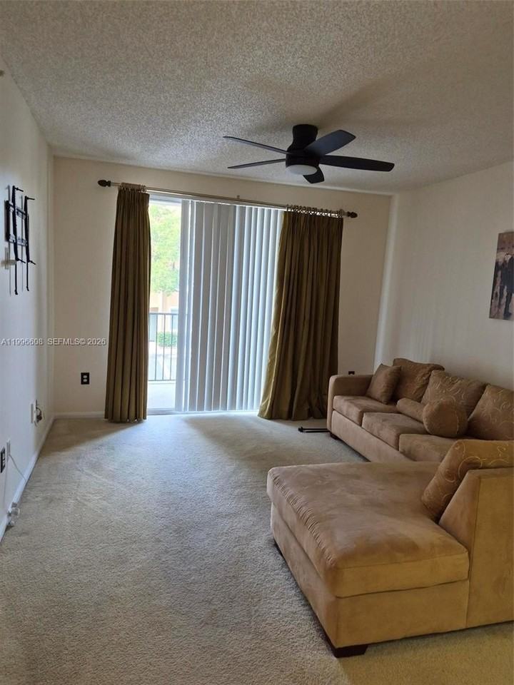 8050 N Nob Hill Rd #203 - Photo 2 of 9