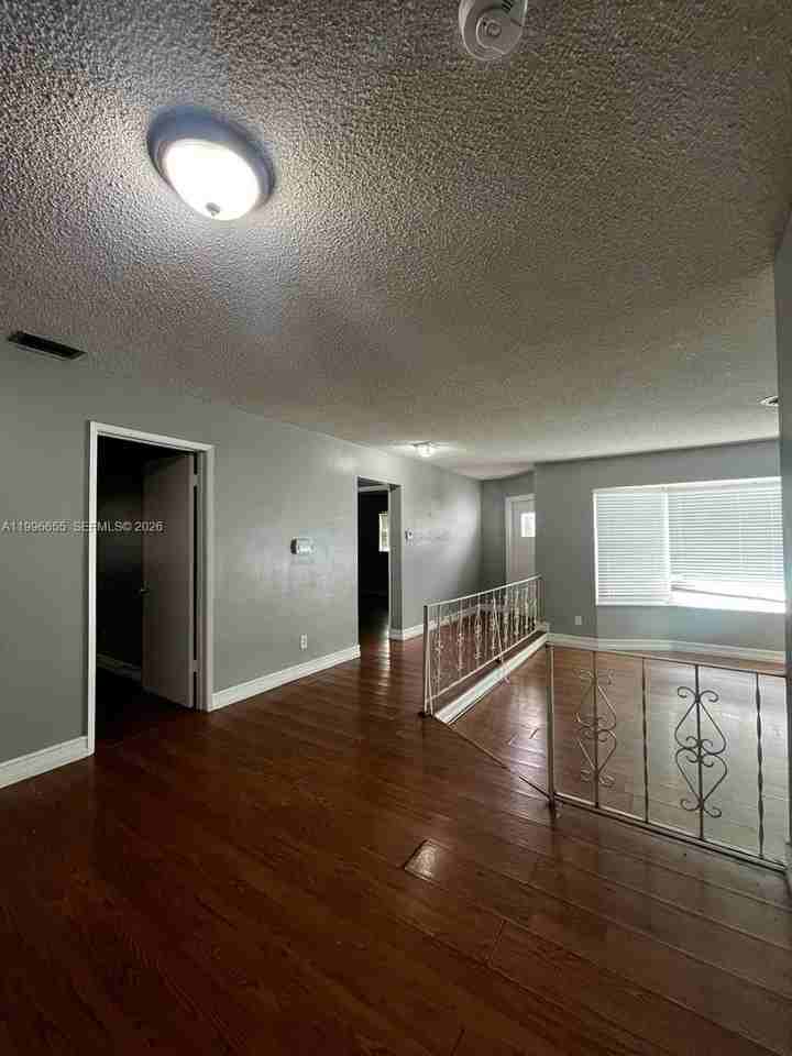 4753 Nw 41st St - Photo 5 of 14