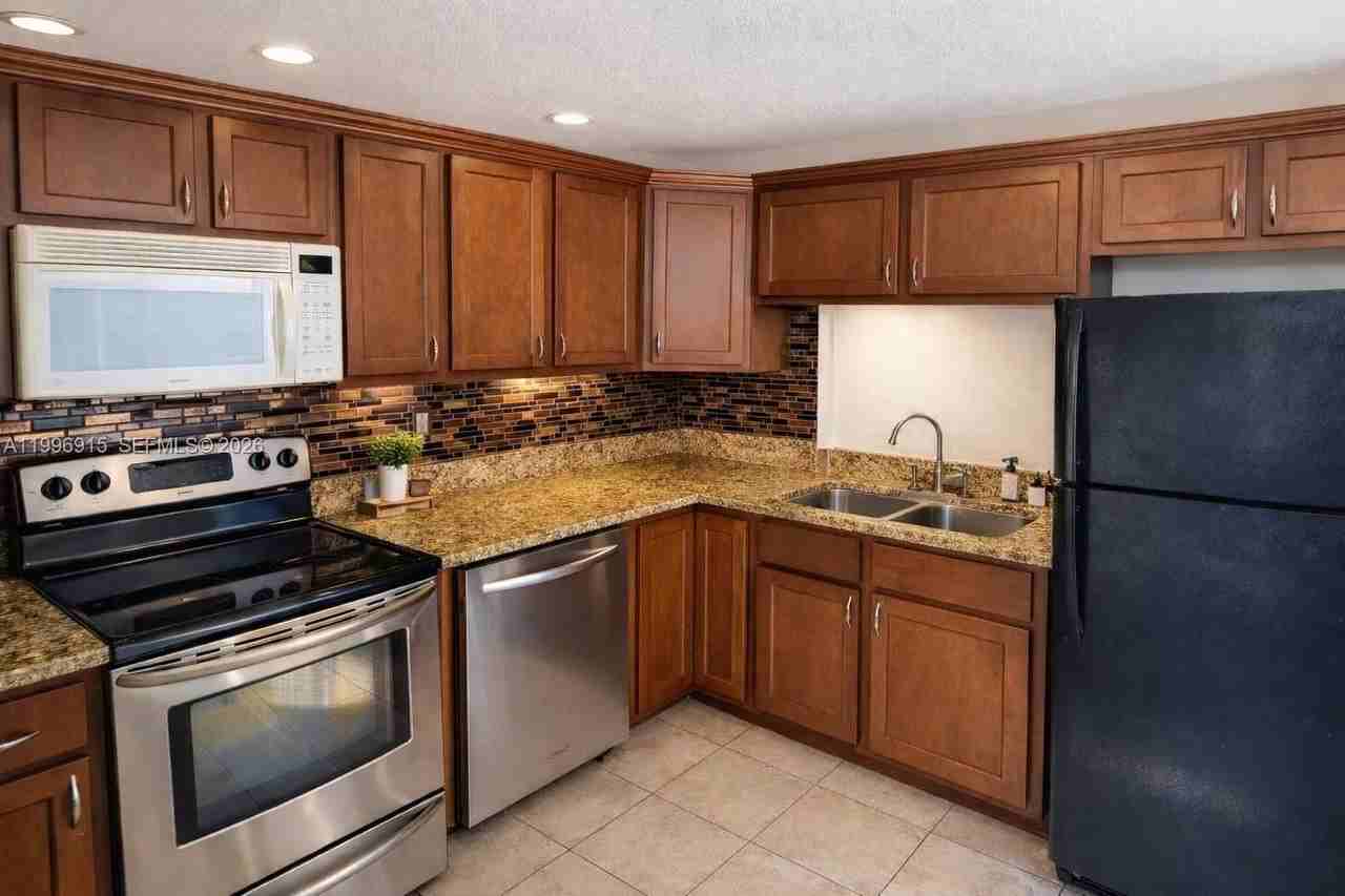 5495 Nw 10th Ct #104 - Photo 2 of 7