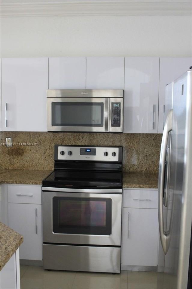 11675 Nw 78th Ln #0 - Photo 3 of 12