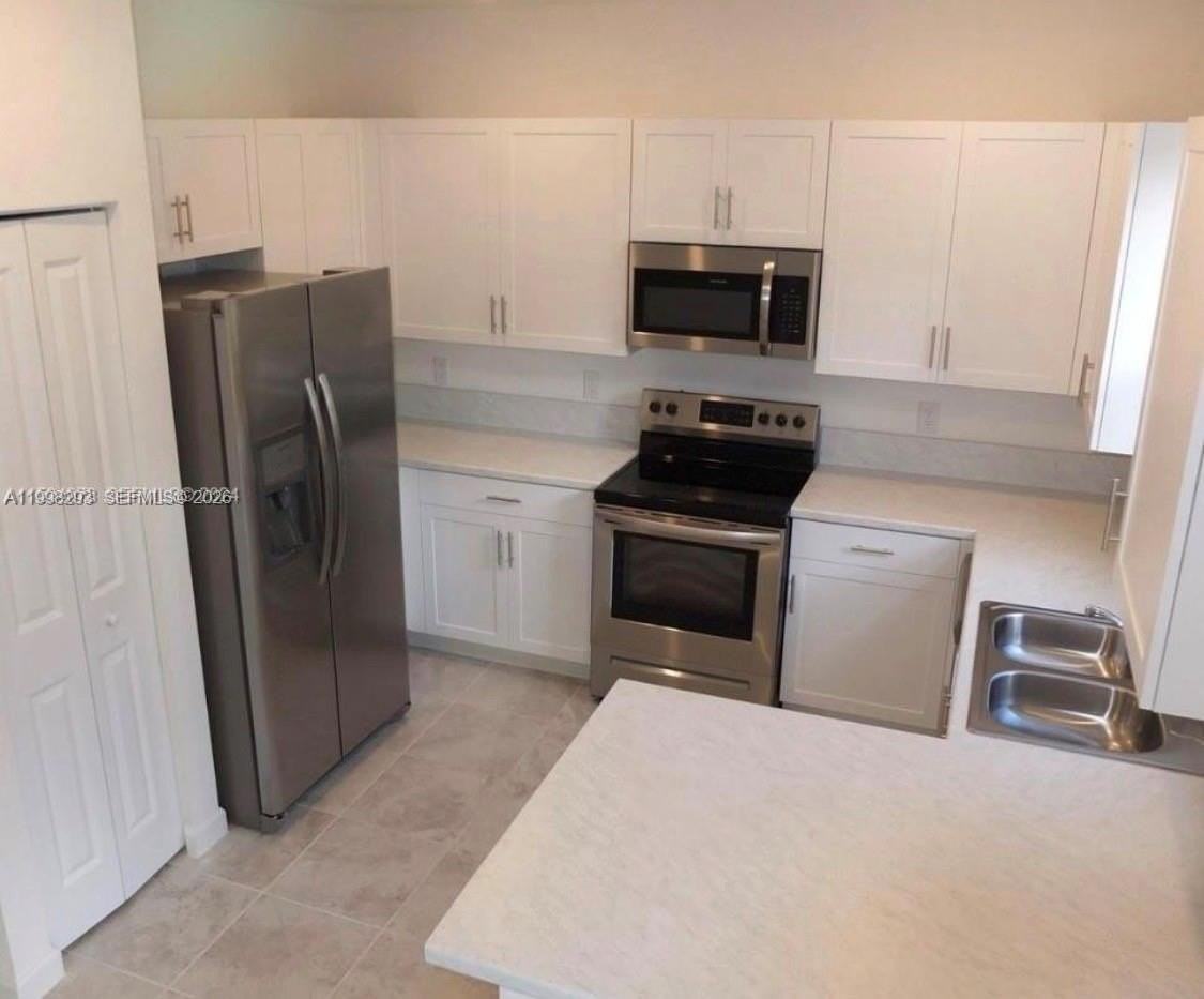 407 Ne 208th Ter - Photo 5 of 7