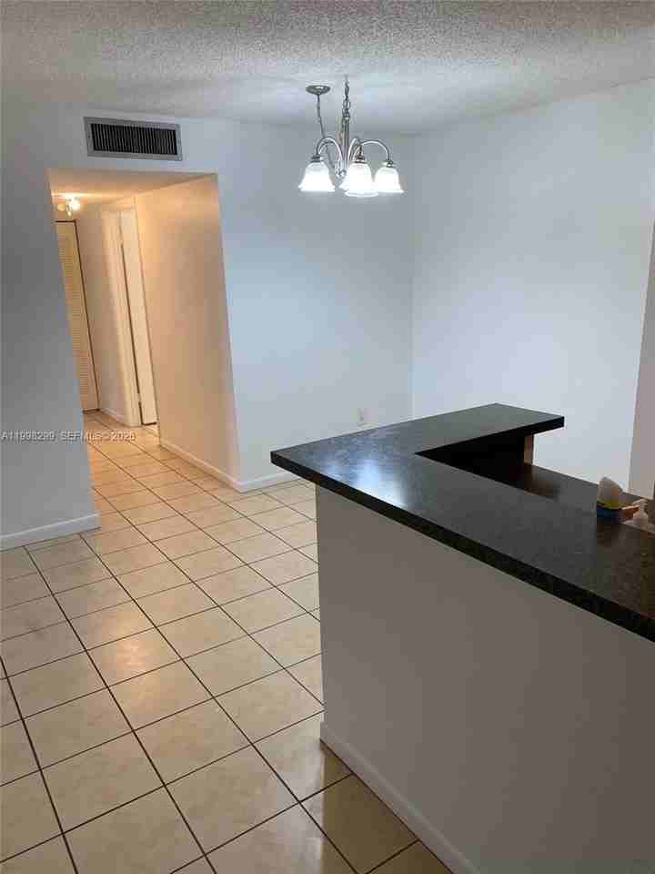 9608 W Mcnab Rd #103 - Photo 2 of 8