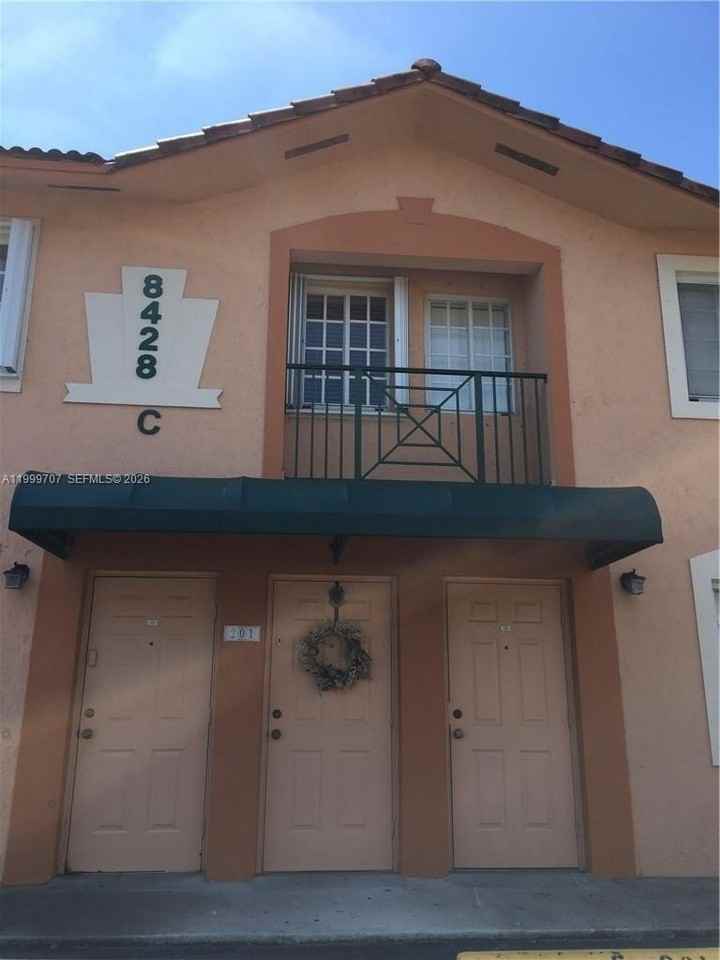 8428 Nw 103rd St #104C - Photo 3 of 35