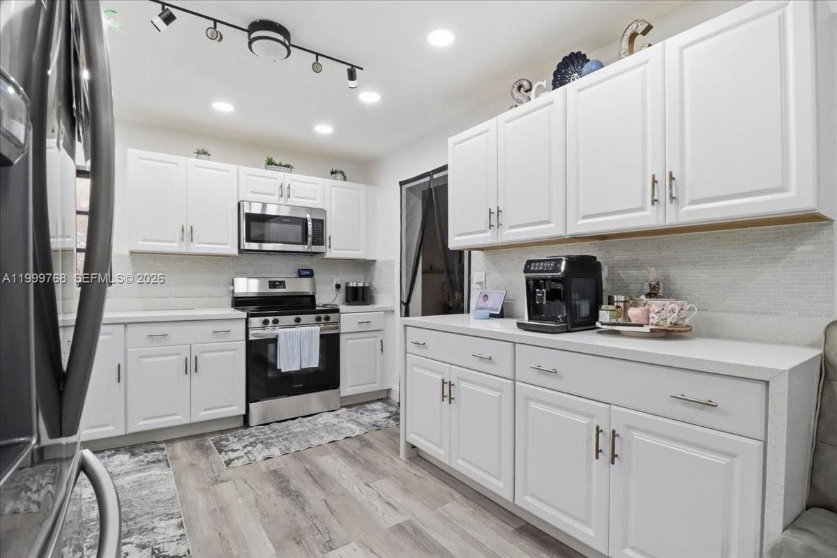 7551 Polk St - Photo 3 of 39
