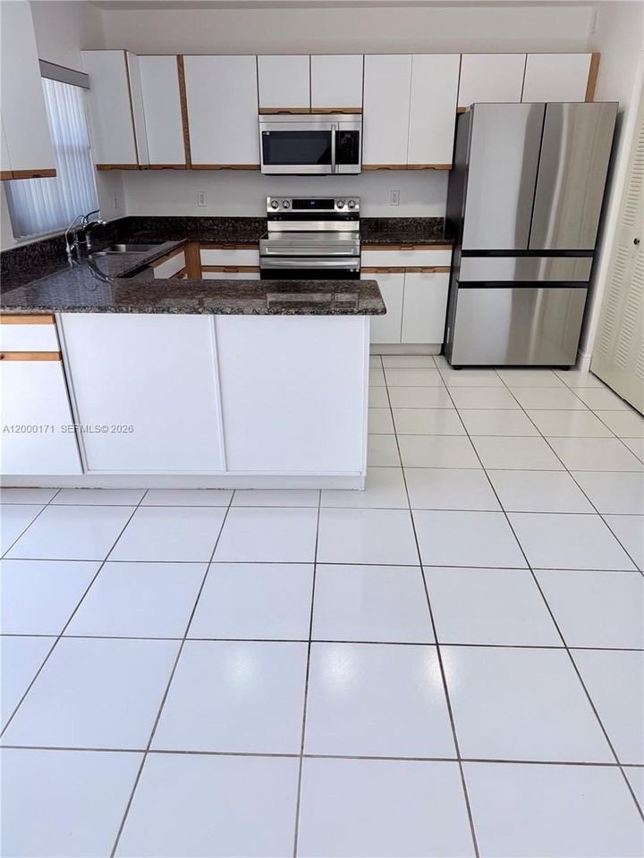 1441 Nw 122nd Ter - Photo 4 of 19