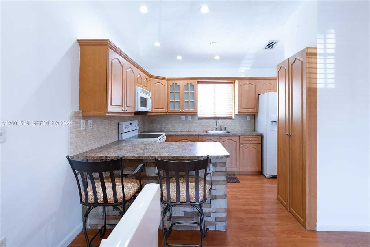 10017 W Okeechobee Rd #202 - Photo 3 of 30