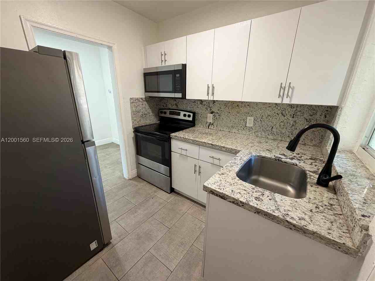 7712 Ne 1st Ct - Photo 4 of 11