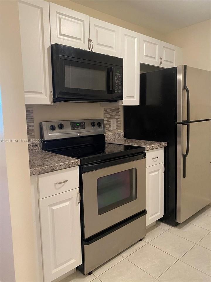 800 Sw 131st Ave #311F - Photo 2 of 28