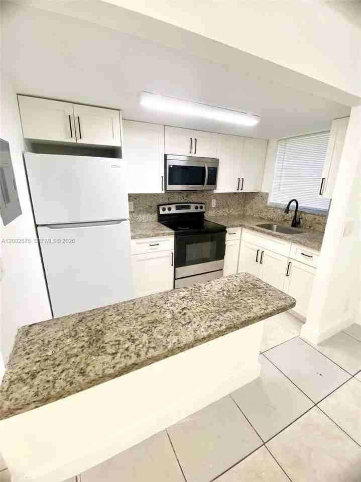 850 Sw 74th Ter #1 - Photo 3 of 12