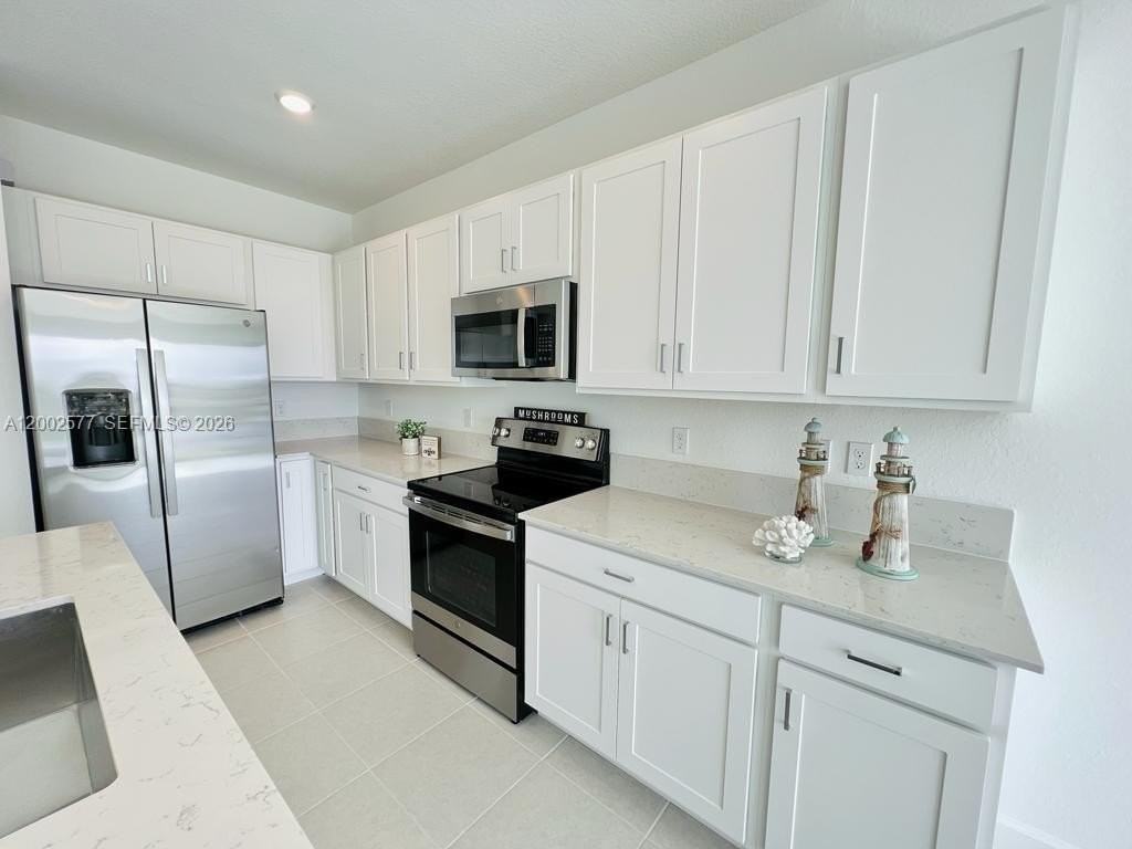 212 Se Woodbark St - Photo 5 of 29