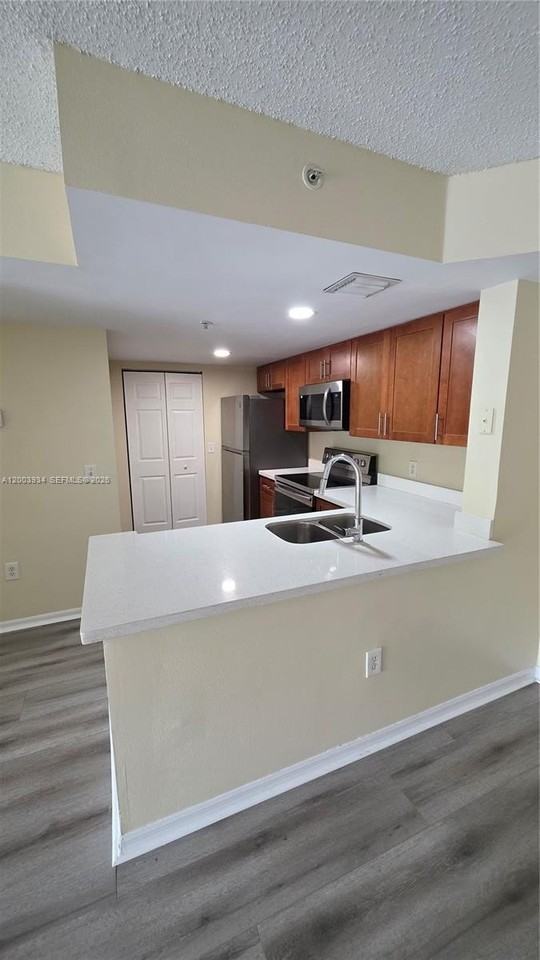 5051 Wiles Rd #201