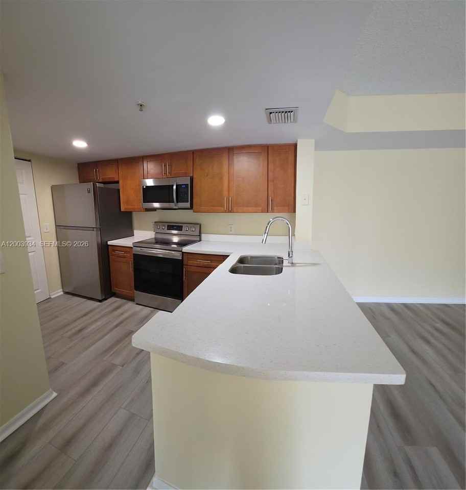 5051 Wiles Rd #201 - Photo 2 of 43