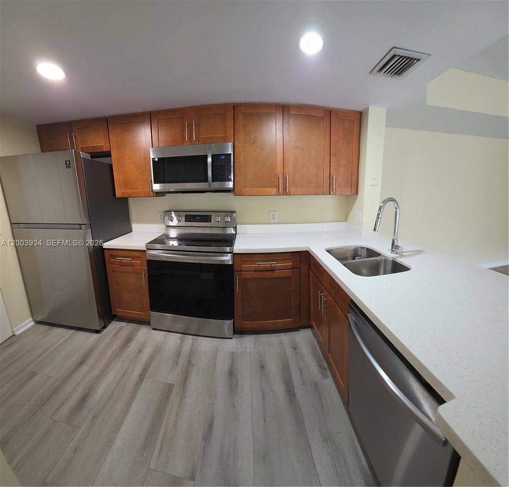 5051 Wiles Rd #201 - Photo 4 of 43
