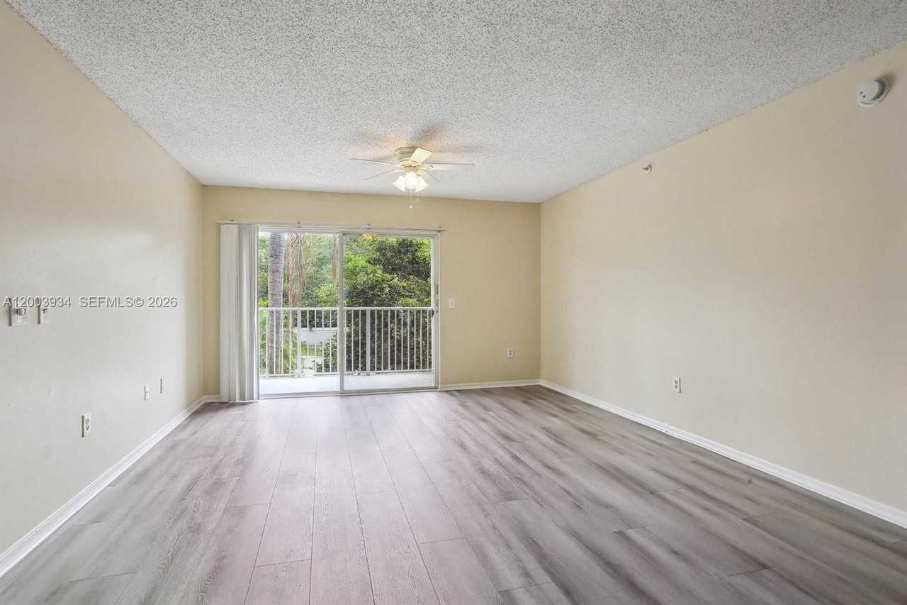 5051 Wiles Rd #201 - Photo 5 of 43