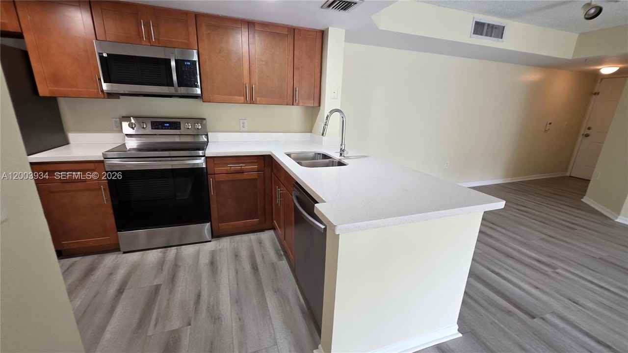 5051 Wiles Rd #201 - Photo 6 of 43