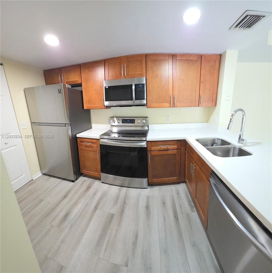 5051 Wiles Rd #201 - Photo 7 of 43