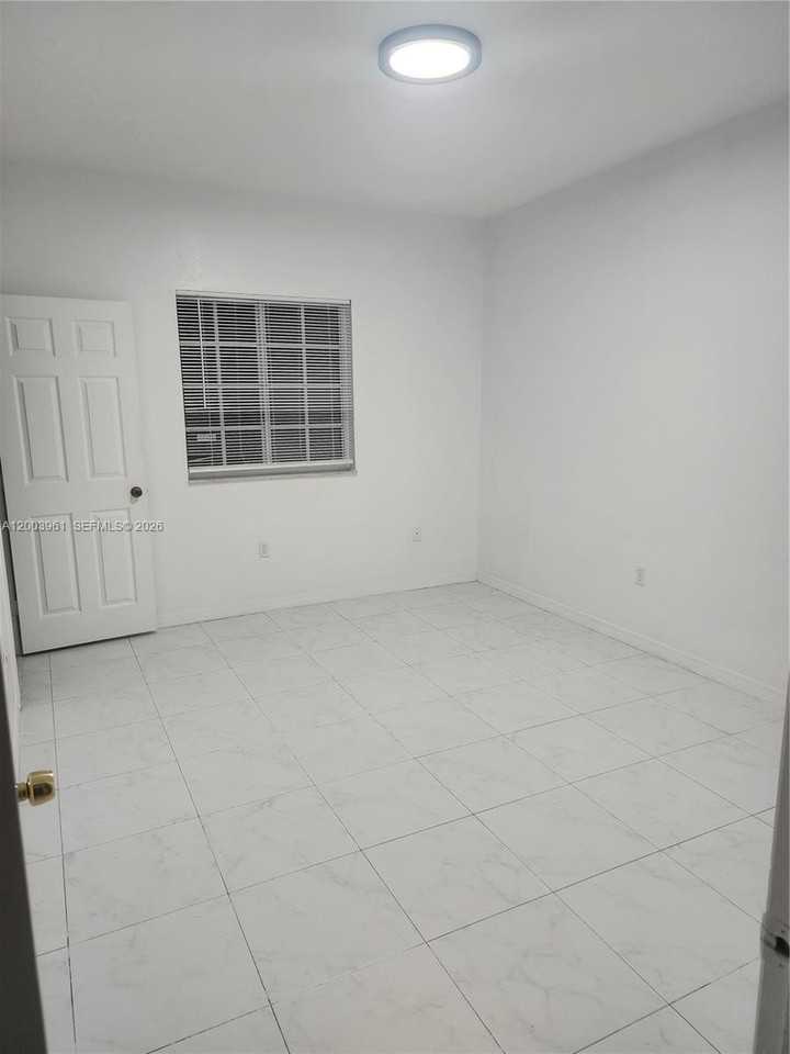 6972 Nw 179th St #203-4 - Photo 2 of 10