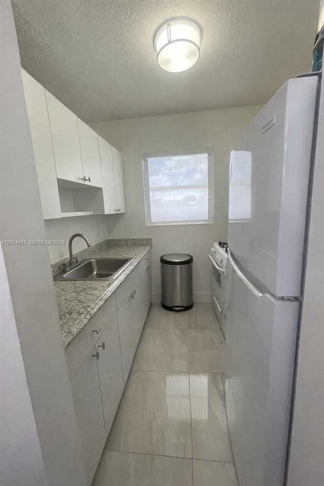 1255 W 49th Pl #E102 - Photo 7 of 12