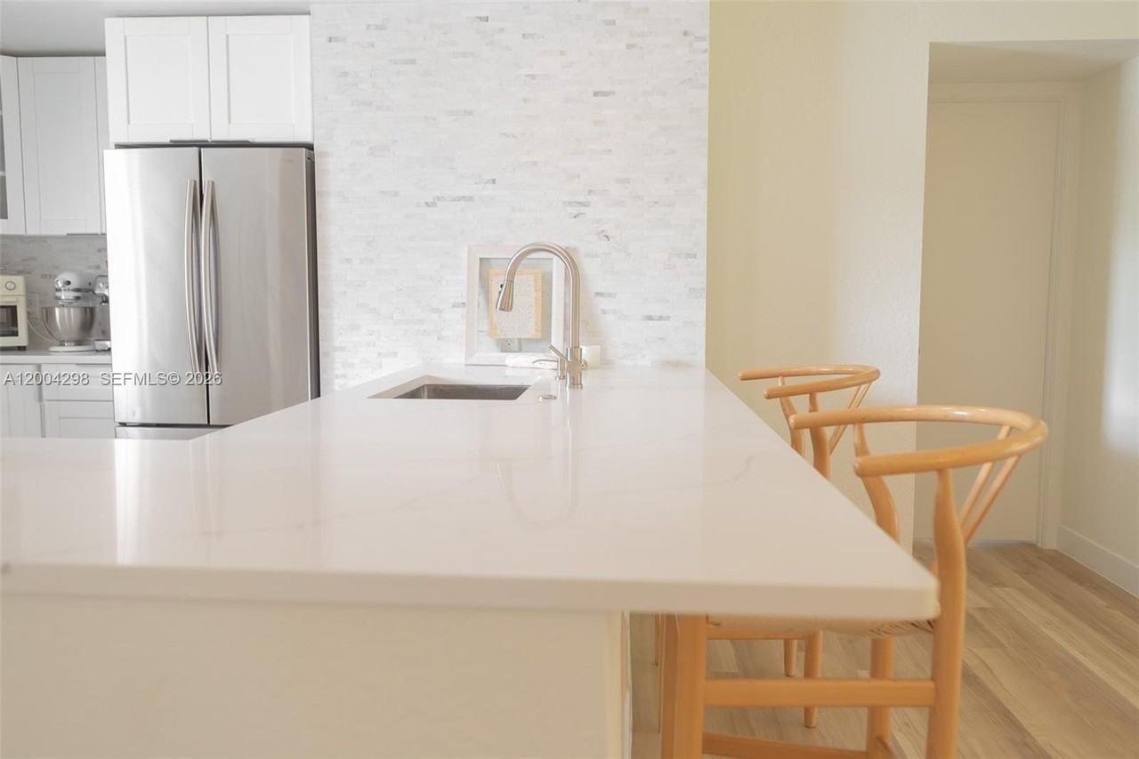 3250 N Palm Aire Dr #202 - Photo 2 of 25