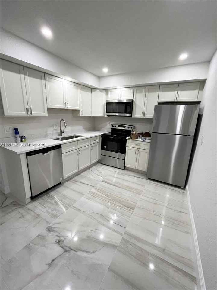 8011 Nw 44th Ct #1 - Photo 3 of 11