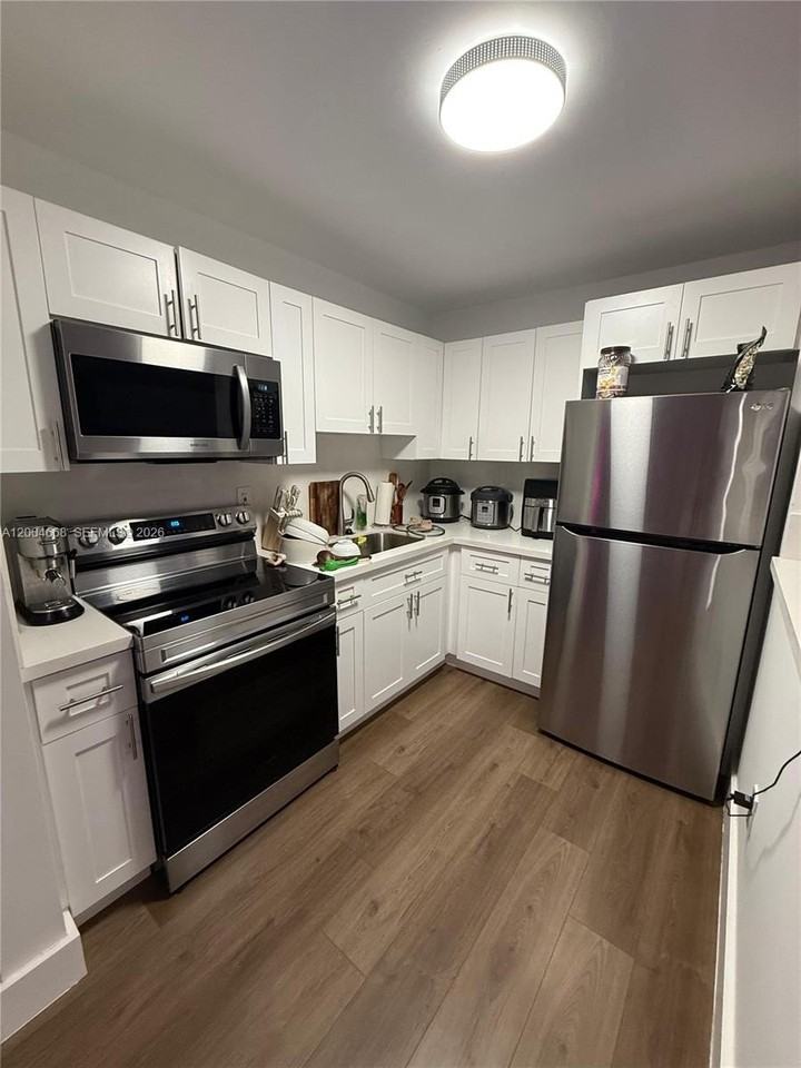 7155 Nw 179th St #107 - Photo 3 of 8