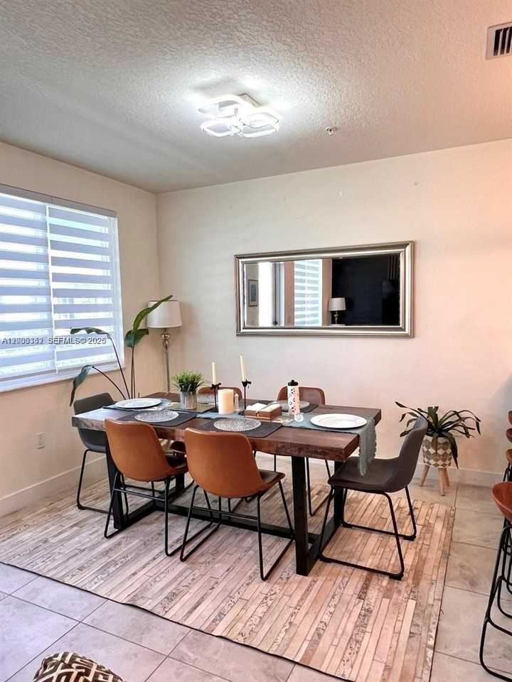 6420 Nw 102nd Path #304 - Photo 2 of 24