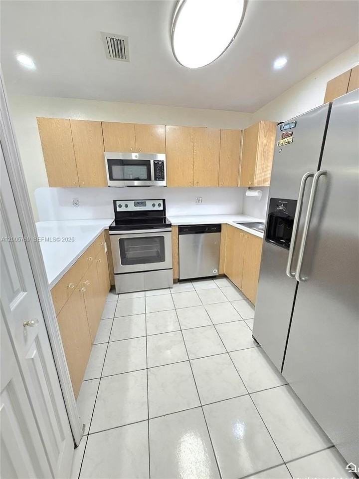 6755 Nw 182nd St #104 - Photo 5 of 23