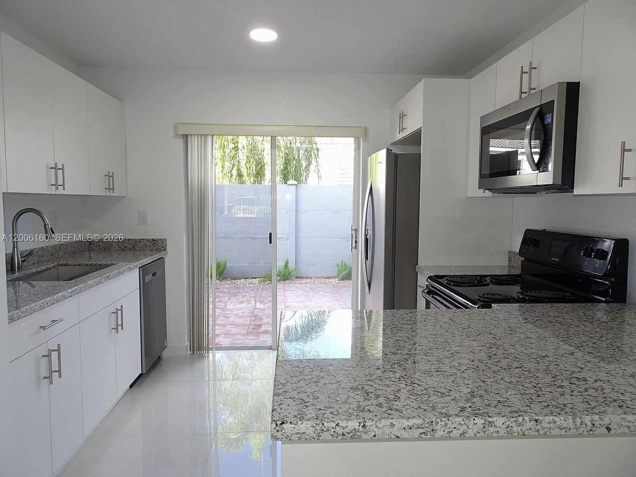 7921 Sw 152nd Ave #1 - Photo 3 of 40