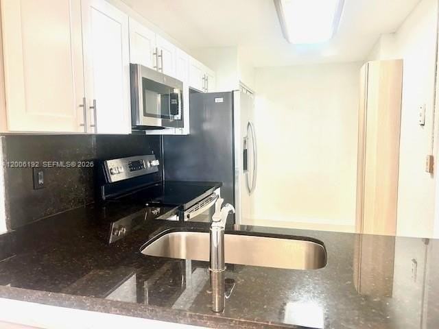 871 Ne 207th Ter #4-101 - Photo 2 of 12