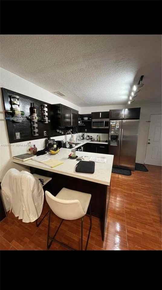 4765 Nw 184th Ter #1 - Photo 4 of 11