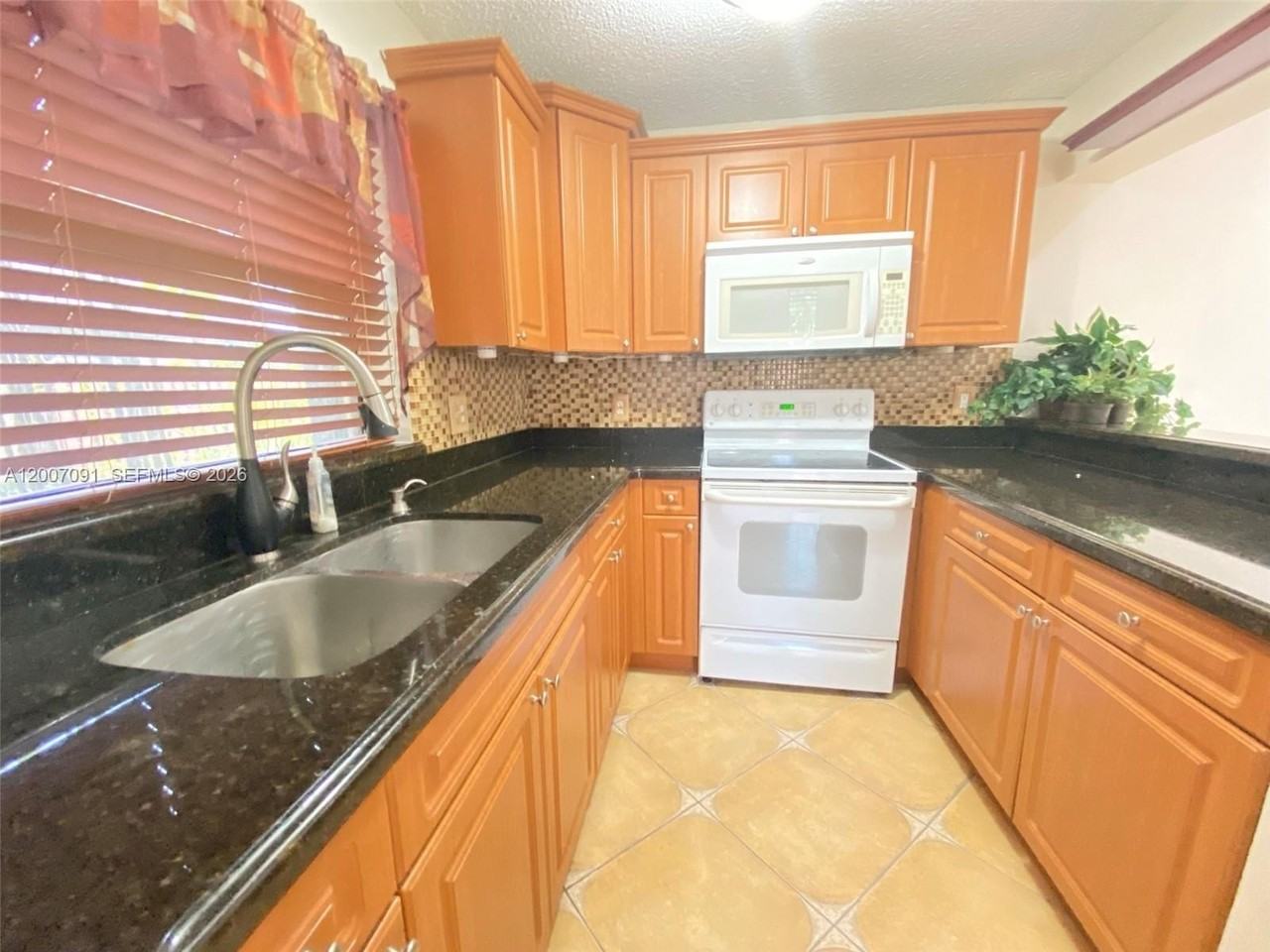 6535 W 24th Ct #2-12 - Photo 5 of 11