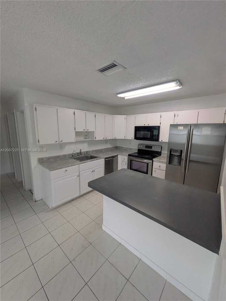 8033 Nw 41st Ct #0 - Photo 2 of 15