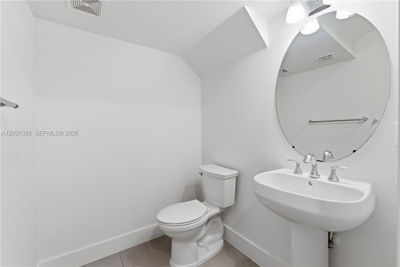 13012 Riverwalk Cir N - Photo 3 of 26