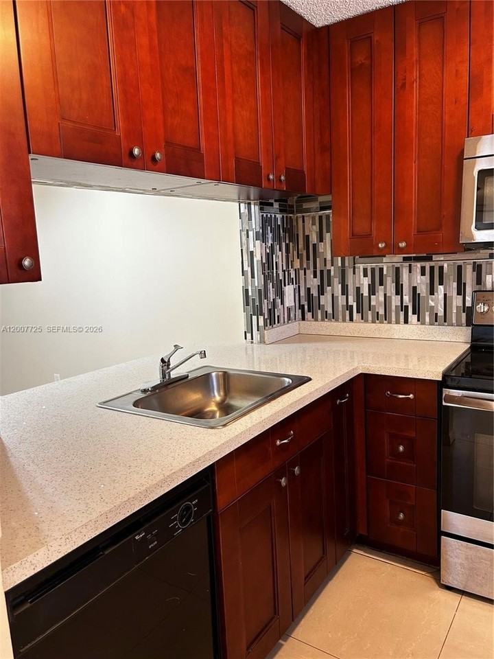 713 Nw 103rd Ter #203 - Photo 2 of 18