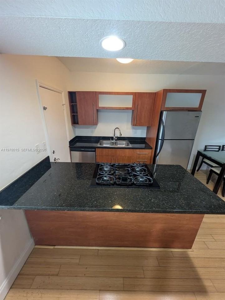 10101 W Bay Harbor Dr #9 - Photo 2 of 5